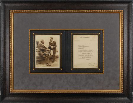 Lot #220 Henry and Edsel Ford: Henry and Edsel Ford congratulate a dealer for moving 100 cars in a month - Image 1