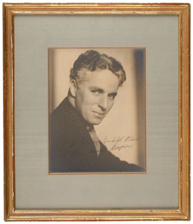 Lot #8102 Charlie Chaplin Signed Photo Inscribed to William Randolph Hearst - Image 1
