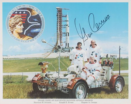 Lot #9467 Gene Cernan Signed Photograph and Book - Image 1