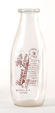 Lot #2309 Woodstock Yasgur Farm Milk Bottle - Image 1