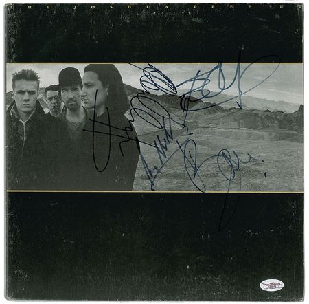 Lot #2456 U2 Signed Album - Image 1