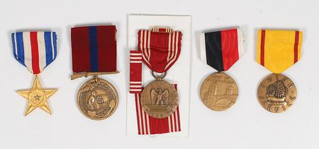 Lot #400 Military Field Manuals and Medals - Image 1