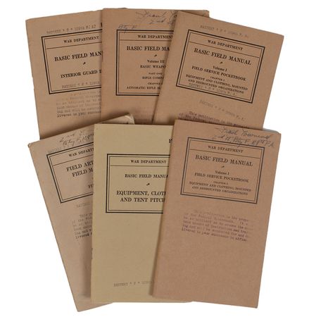 Lot #400 Military Field Manuals and Medals - Image 2