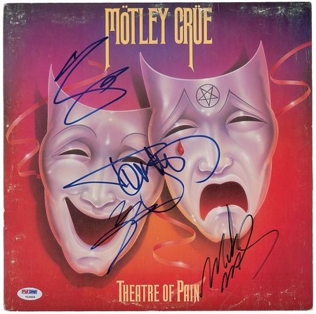 Lot #7532 Motley Crue Signed Album - Image 1
