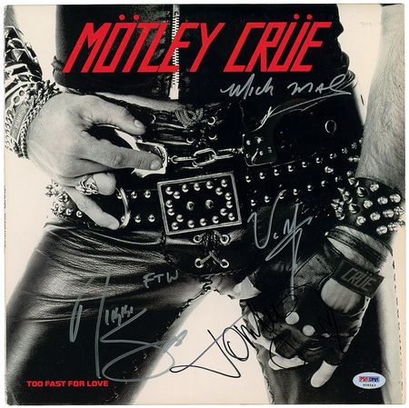 Lot #7533 Motley Crue Signed Album - Image 1