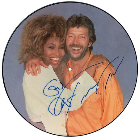 Lot #7518 Eric Clapton and Tina Turner Signed Picture Disc - Image 1
