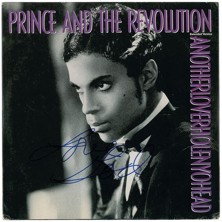 Lot #7539 Prince Signed Album - Image 1