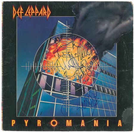 Lot #7522 Def Leppard Signed Album - Image 1