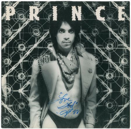 Lot #7540 Prince Signed Album - Image 1