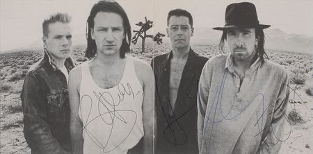 Lot #7546 U2 Signed CD Insert - Image 1