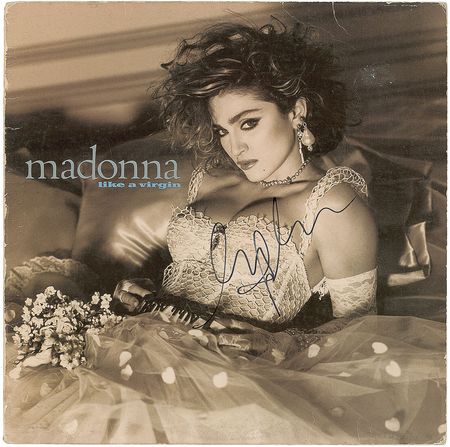 Lot #7228 Madonna Signed Album - Image 1