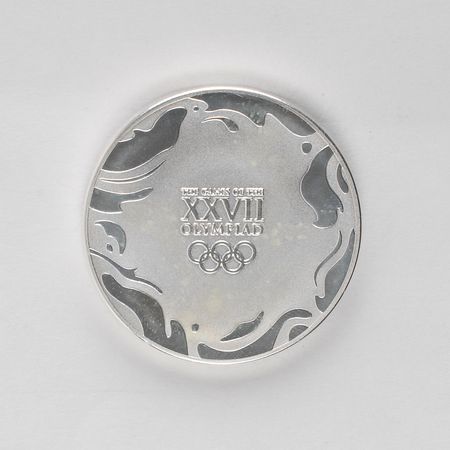 Lot #9139 Sydney 2000 Summer Olympics Silver-Colored Participation Medal - Image 1