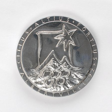 Lot #9126 Albertville 1992 Winter Olympics Chrome-Plated Steel Participation Medal - Image 1