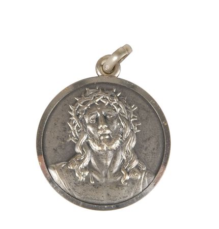 Lot #6219 Jim McDivitt’s Apollo 9 Flown Jesus Pendant - Image 1