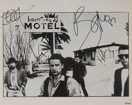 Lot #7393 U2 Signed Photograph - Image 1