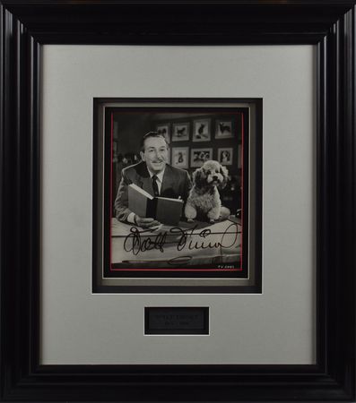Lot #342 Walt Disney: Superior uninscribed portrait of Disney and pup - Image 1