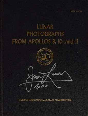 Lot #8200 James Lovell Signed Lunar Photo Book - Image 1