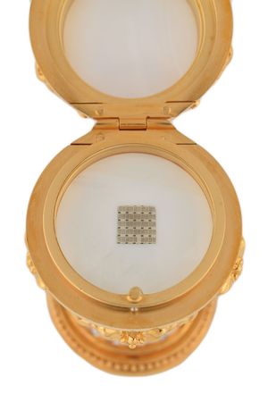 Lot #43 Edgar Mitchell's Apollo 14 Lunar Surface-Flown Bible Text Fragment: Dual-certified Lunar Bible housed within a Faberge Egg - Image 2