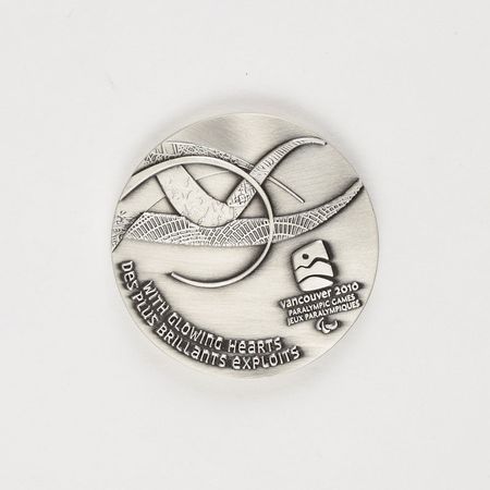 Lot #3196  Vancouver 2010 Winter Olympics Pair of Olympic Volunteer and Paralympic Participation Medals - Image 1