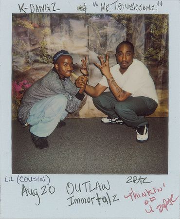 Lot #4289 Tupac Shakur Handwritten Letter and Signed Candid Photo - Image 1