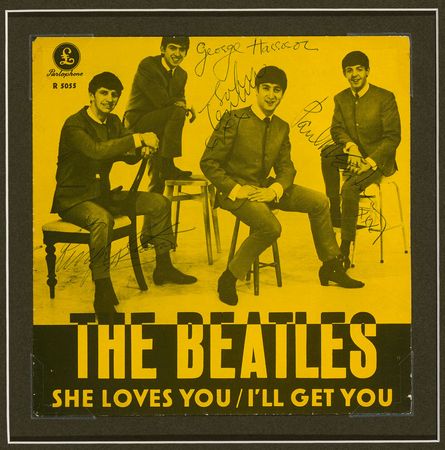 Lot #7077  Beatles Signed 45 RPM Sleeve - Image 1