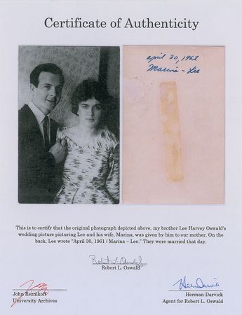 Lot #108 Lee and Marina Oswald Annotated 1961 Wedding Photograph: The Oswalds on their wedding day: 
