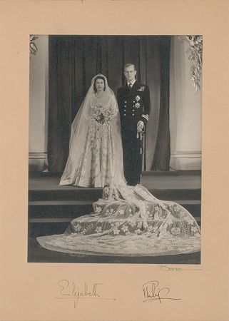 Lot #305 Queen Elizabeth II and Prince Philip: Marvelous royal wedding portrait by Baron - Image 1