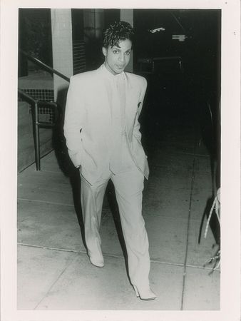 Lot #6130  Prince Original Photograph Walking in White Suit - Image 1
