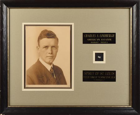 Lot #397 Charles Lindbergh: Stunning display featuring a 1927 signed portrait and fabric from the Spirit of St. Louis - Image 1