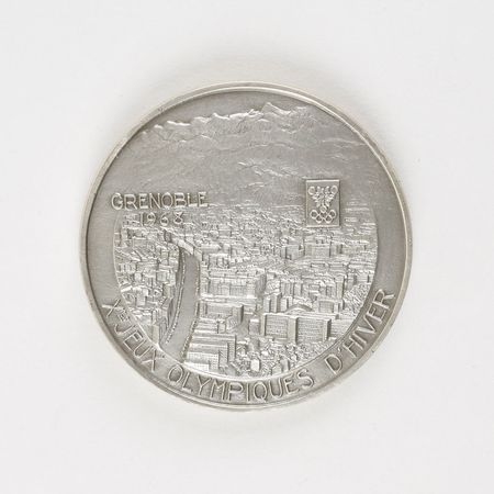 Lot #3085  Grenoble 1968 Winter Olympics Silver Participation Medal - Image 1