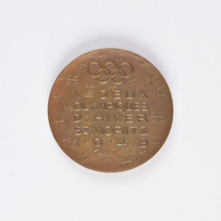 Lot #3060  St. Moritz 1948 Winter Olympics Bronze Participation Medal - Image 1