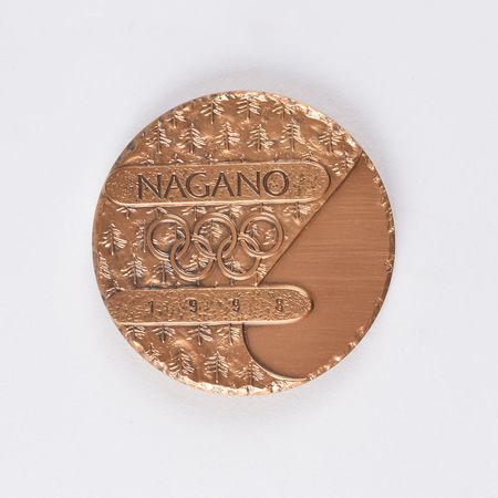 Lot #918 Nagano 1998 Winter Olympics Bronze Participation Medal Participation Medal - Image 1