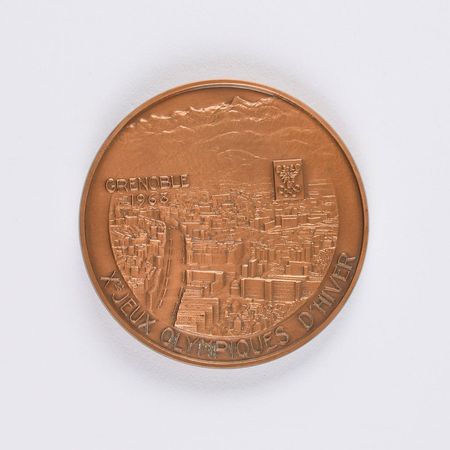 Lot #8072  Grenoble 1968 Winter Olympics Bronze Participation Medal - Image 1