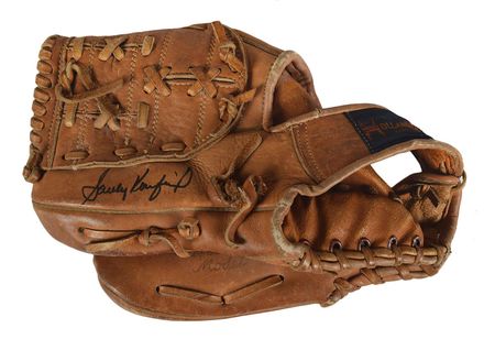 Lot #9275 Sandy Koufax Signed Program and Glove - Image 1