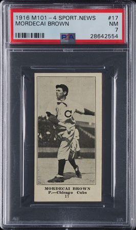 Lot #9072  1916 M101-4 Altoona Tribune #17 Mordecai Brown PSA NM 7 - Image 1