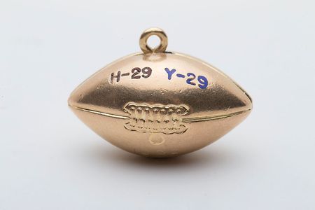 Lot #9442 John Yovicsin's 1968 Harvard vs. Yale and Ivy League Championship Charms - Image 1