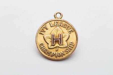 Lot #9442 John Yovicsin's 1968 Harvard vs. Yale and Ivy League Championship Charms - Image 2