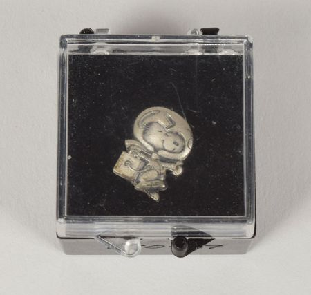 Lot #192 STS-27 Flown Silver Snoopy Pin: Shuttle-flown 'Silver Snoopy' award for a skilled Rockwell machinist - Image 1
