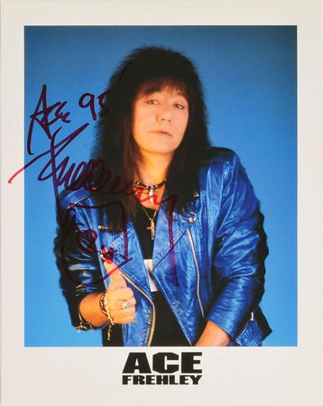 Lot #2443  KISS: Ace Frehley Signed Poster and Photograph - Image 1