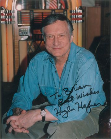 Lot #881 Hugh Hefner Signed Photographs - Image 1
