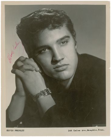 Lot #624 Elvis Presley: Twice-signed Elvis photo with several of his band members - Image 1