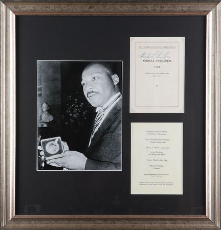 Lot #120 Martin Luther King, Jr: Extraordinary 1964 Nobel Peace Prize program signed by the recipient, Dr. Martin Luther King, Jr. - Image 1