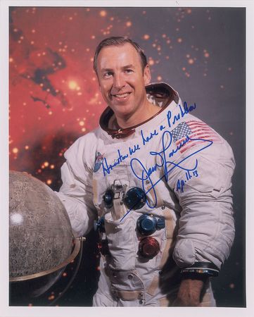 Lot #4528 James Lovell Signed Photograph and Cover - Image 1