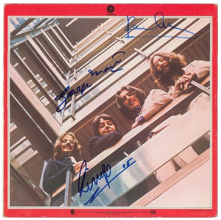 Lot #5046  McCartney, Starr, and Martin Signed Album - Image 1