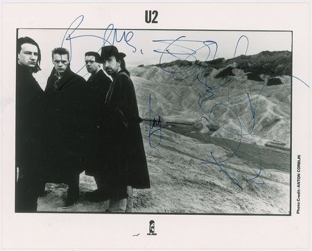 Lot #598 U2 Signed Photograph - Image 1
