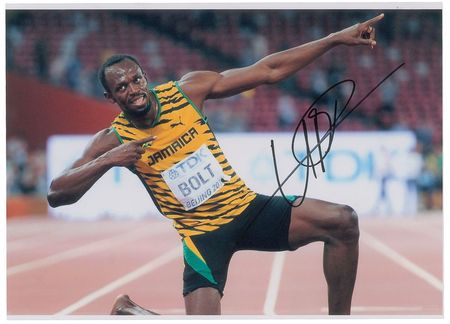 Lot #907 Usain Bolt Signed Photographs - Image 1