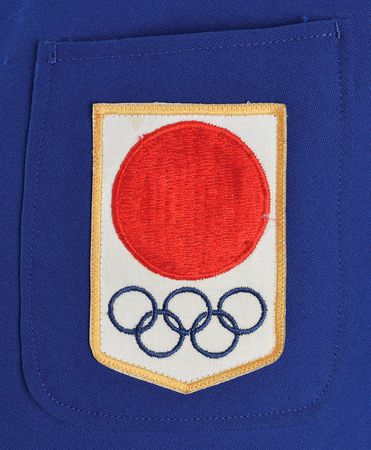 Lot #3069  Tokyo 1964 Summer Olympics Torch with Medallion and Suit - Image 2