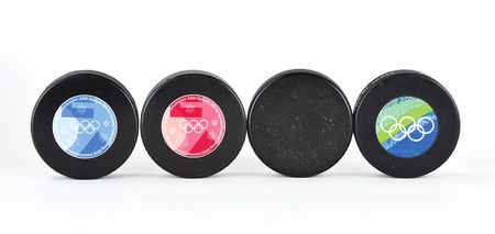 Lot #3112  Winter Olympics Group of (4) Hockey Pucks - Image 2