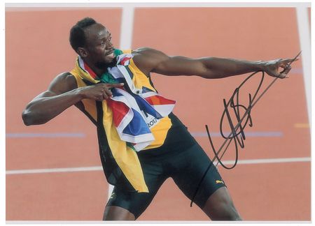 Lot #922 Usain Bolt Signed Photographs - Image 1