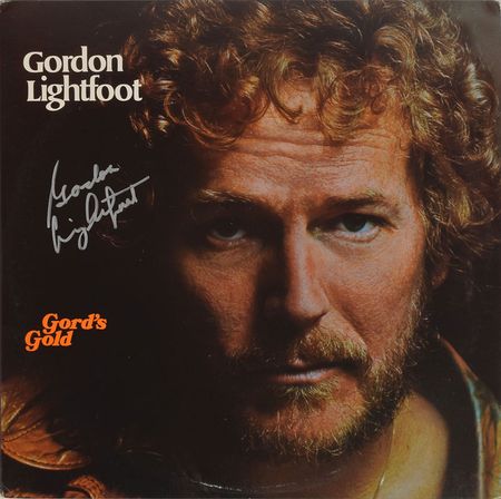 Lot #4448 Gordon Lightfoot Signed Guitar and Album - Image 1
